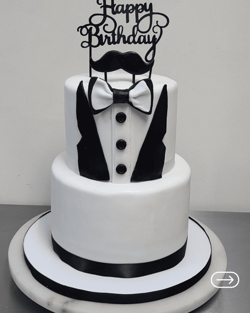 Designer black and white tuxedo cake with sharp fondant detailing